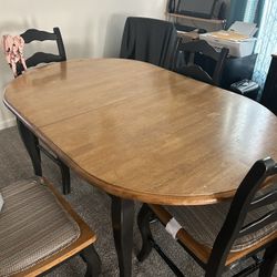 A Table With Six Chairs