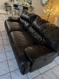 Brown Leather Reclining Sofa