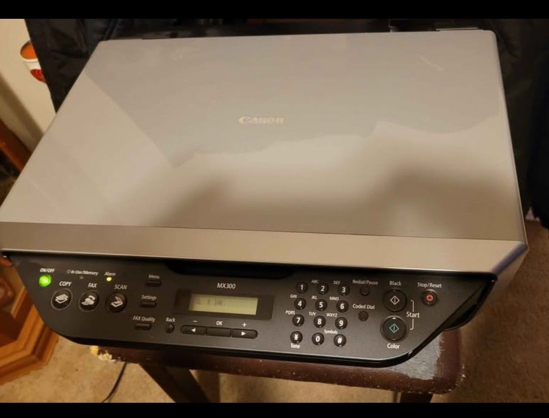 canon mx300 all in one printer scanner fax copy. works needs ink. Good condition.