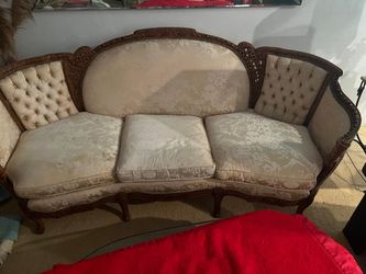 Couch hand carved 100 years  old