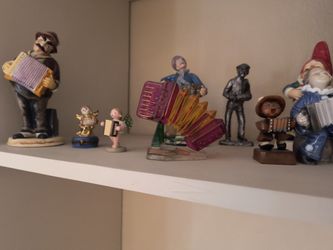 Collection Of Hummel Figures Playing Accordion