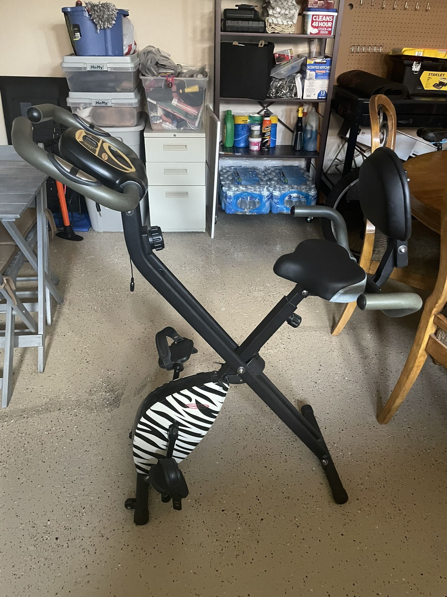 Small Patio Set, Exercise Bike, Light Fixture