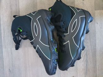 Under Armor size 9.5 high top black gray and green football cleats