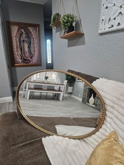 Gold-colored decorative wall mirror/Cash Only