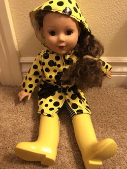 Doll with rain coat and boots - toddler girl
