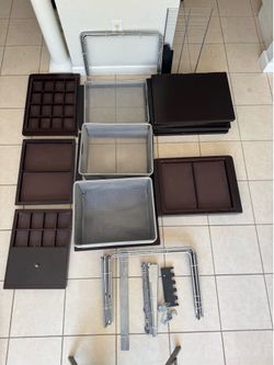 Container brand closet for assembly. It may be missing a few pieces.