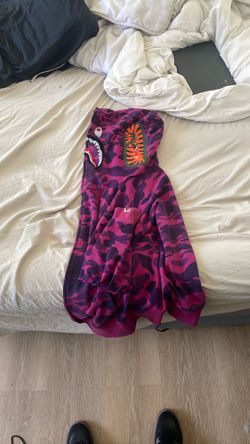 Purple bape small but fits like a medium/large