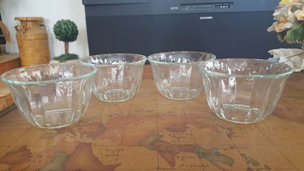 A set of 4 beautiful glass dishes