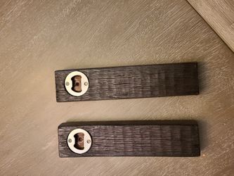 Custom made bottle opener made out of whiskey/wine staves