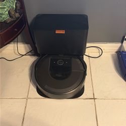 Roomba With Self Cleaning Box