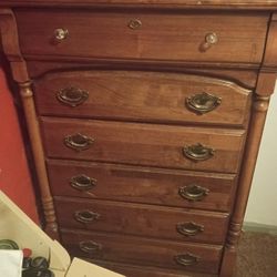 two very sturdy well made dressers one is supposedly worth almost $3,000 and the other one is a basset I believe and they're both in excellent shape I
