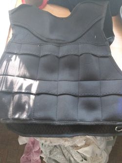 Weight lifter support vest. With Cell Phone Holder.