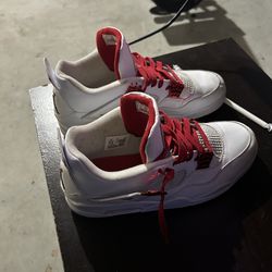 Metallic Red Jordan 4s