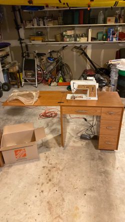 Working Singer sewing machine, cabinet and assorted supplies