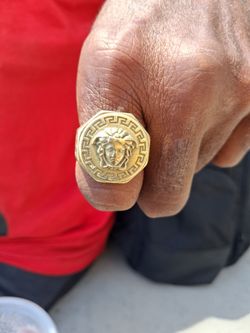 Medusa 18K gold ring .It is double stamped on the inside of the ring