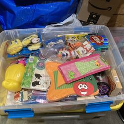 Bin of vintage toys