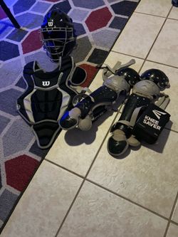 Kids size Wilson catchers gear with Easton knee savers