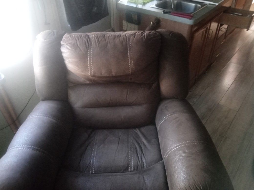 (Real Leather )Rocking Recliner Chair.