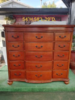 Brown 15 drawer wood dresser