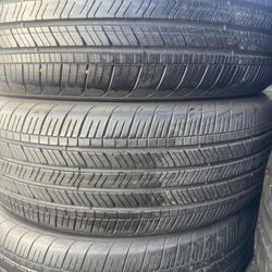 (4) 235/50R21 SET OF USED TIRES GOOD YEAR 80% LIFE !!