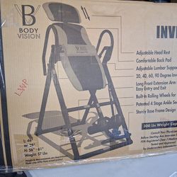 Brand new deluxe inversion table 300 lb weight capacity in a box new $80 no less!