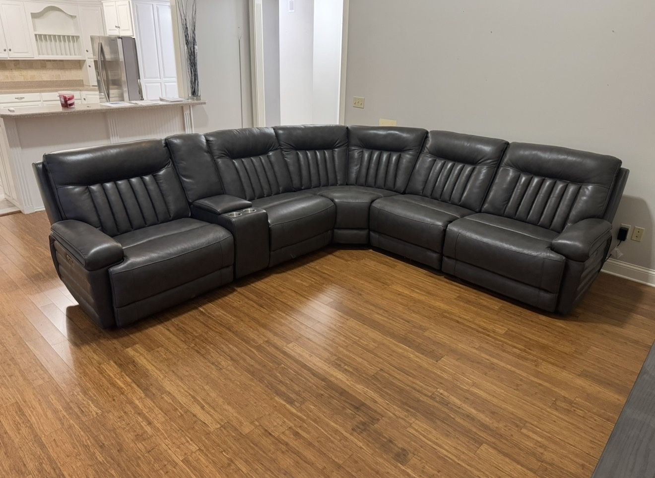 GRAY LEATHER SECTIONAL W/ POWER RECLINERS