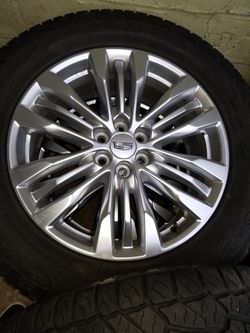 Cadillac set of 4 wheels.