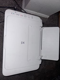 This is a white Canon PIXMA MG2522 all-in-one inkjet printer.