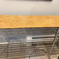 Iron And Rattan Plant Stand Side Table. Measures 28 Inches Tall 14 Inches Deep And 48 Inches Long. Solid And Heavy.