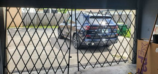 Folding security gate 12 x 6' metal