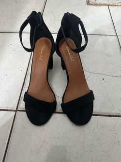 Women’s black heals