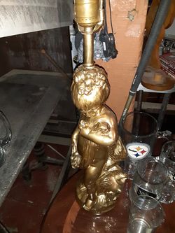 Gold cherub lamp
