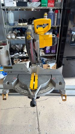 Dawalt saw miter  12 Dual Bevel and stand 12  ft combo