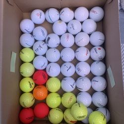50 Golf Balls Titleist In Good Condition.