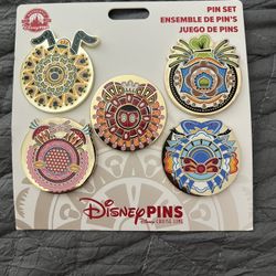 This is the Disney Cruise Line Lookout Cay Lighthouse Point Exclusive Junkanoo-Inspired Pin Set. 