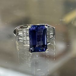 18kt White Gold 6.21 CT Tanzanite And 1.5 CT Diamond Ring