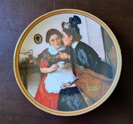 This 1983 Knowles collector plate features Norman Rockwell's "Gossiping in the Alcove"