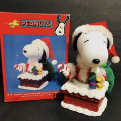Peanuts 10.75” Snoopy Santa Animated and Musical Tablepiece