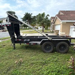 Trailer And 5 Dumpsters 