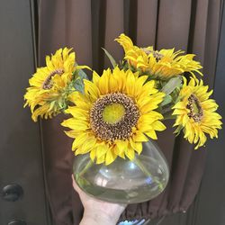 Artificial sunflowers glass vase