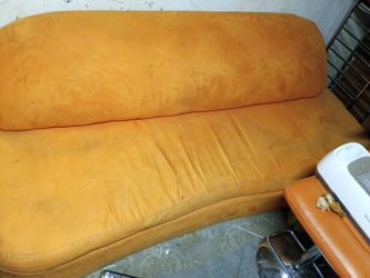 Groovy orange couch.