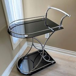Black glass chrome rolling bar cart