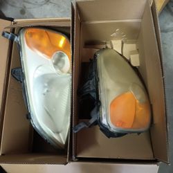 01 02 03 Honda Civic Headlight Assembly No Bulbs. Intact No Chips Or Breaks