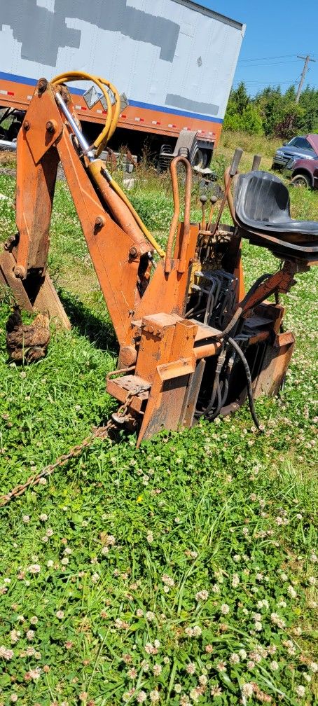Backhoe attachment