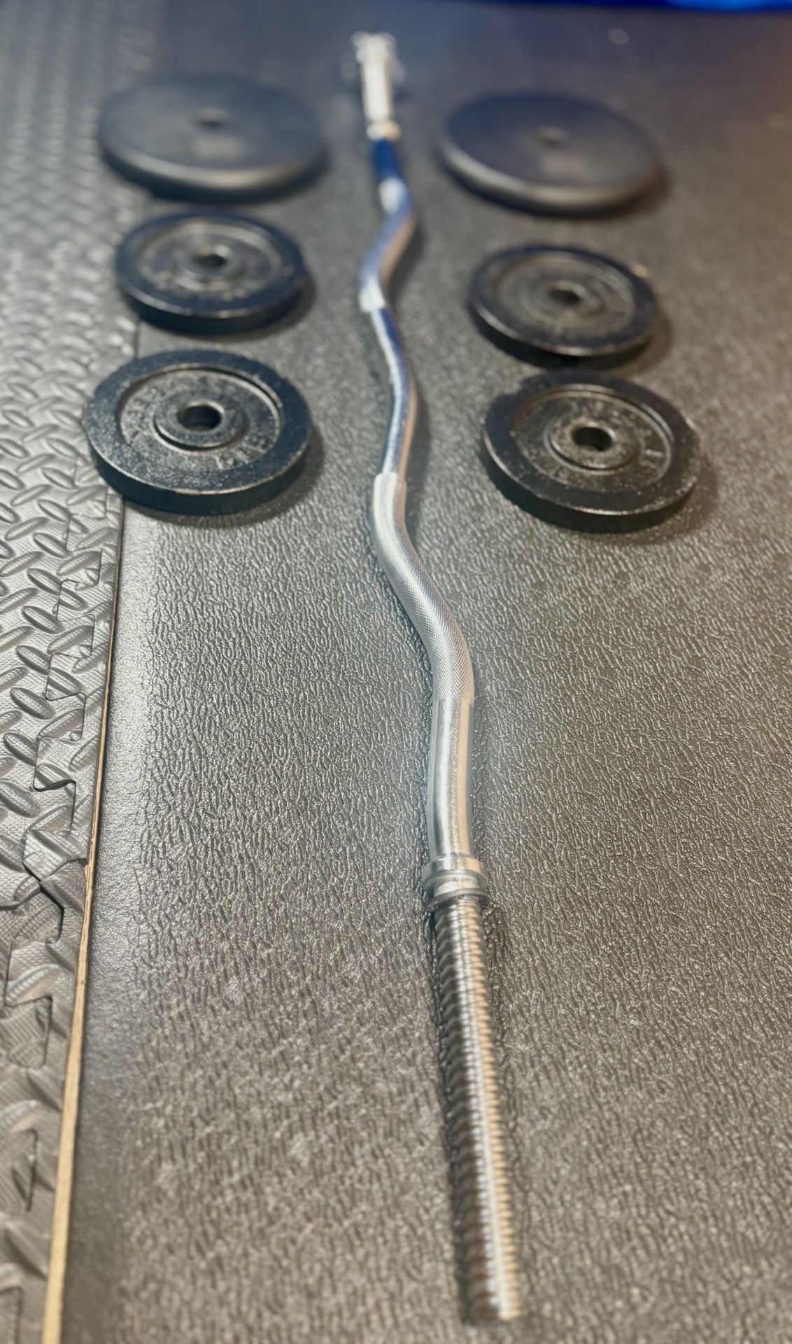 Standard Steel Curl Bar with Cast Iron Weight Plates pairs: 15#, & 4X 5 #. Total: 66 pounds