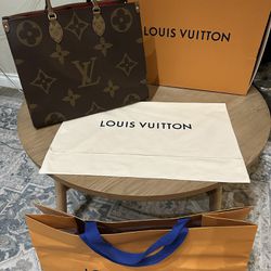 Authentic Louis Vuitton On The Go GM Bag