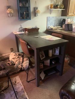 Table and two stools without backs