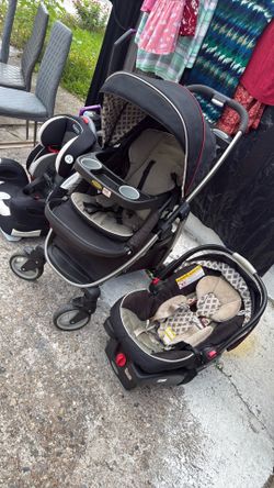 Carriola con su carseat