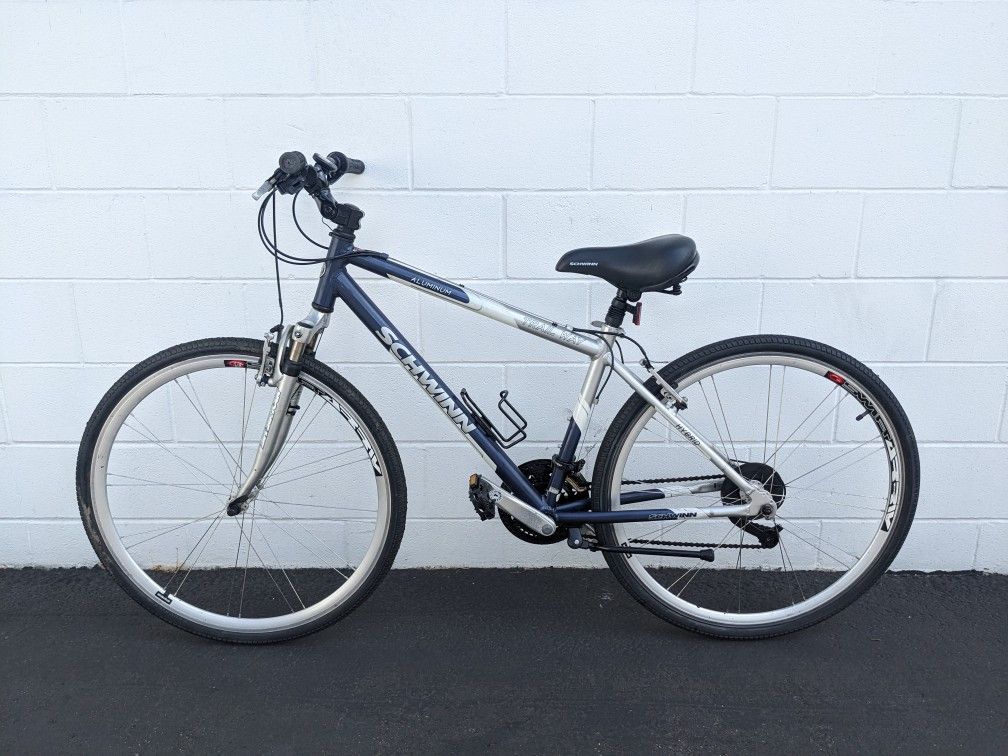 Schwinn 28" 700c 21-Speed Hybrid Road/Commuter/Gravel Bike - Front Shocks - Comfort Seat - Light 17" Frame