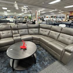 Grey Manual Reclining Sectional Available Now On Memorial Sale! 